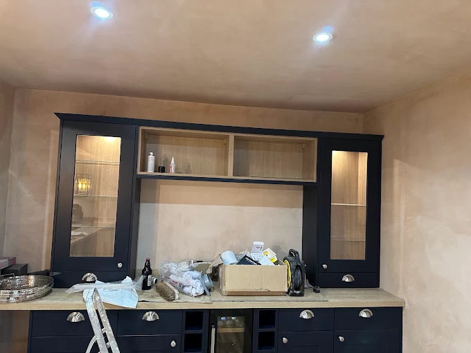 Navy kitchen dresser with integrated cabinet lighting and ceiling spotlights wired by JM Electrical